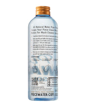 Load image into Gallery viewer, The back of a 12oz 355 ml bottle of Piece Water Solution.