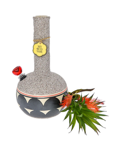 A Coyōté Bud Vase Bong with succulent topper and bottle-brush style artificual flower toker poker removed.