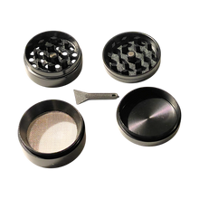 Load image into Gallery viewer, A black Sharpstone Flat Top Grinder 40mm disassembled.