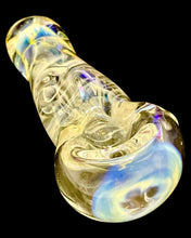 Load image into Gallery viewer, A TKO Fumed Twist Spoon Pipe changing color in the dark.