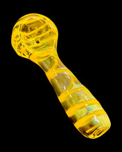 Load image into Gallery viewer, A yellow Kitchen Glass Designs Fumed Swirl Spoon Pipe showing off its color-changing fumed glass.
