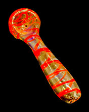 Load image into Gallery viewer, A red Kitchen Glass Designs Fumed Swirl Spoon Pipe showing off its color-changing fumed glass.