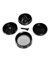 Load image into Gallery viewer, The inside of a black Chromium Crusher Drum Grinder 55mm.