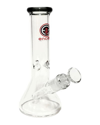 A Clear Beaker Bong with a black mouthpiece and red logo.