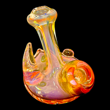 Load image into Gallery viewer, A pink Horned Fumie Dot Stand-Up Spoon Pipe handblown by TKO Glassworks in the dark.