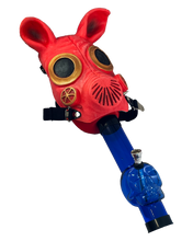 Load image into Gallery viewer, A pig mask Gas Mask Bong with a blue acrylic skull bong.