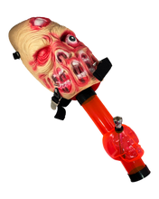 Load image into Gallery viewer, A Zombie Gas Mask Bong with a red acrylic skull bong.