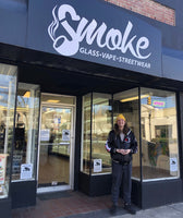 Our founder and owner, Alec Neapolitan, standing in front of our Shadyside store.