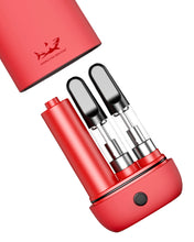 Load image into Gallery viewer, A red Tombstone V2 Double Cartridge Battery &amp; Dab Pen with two 5-10 cartridges inside.
