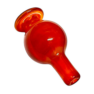 A TKO Glassworks red Colored Bubble Carb Cap.