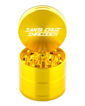 Load image into Gallery viewer, Santa Cruz Shredder 4-Piece Medium Gold Metal Grinder with lid removed.
