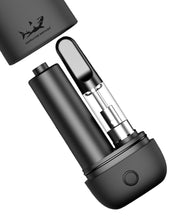 Load image into Gallery viewer, A black Cloak V2 Cartridge Battery &amp; Dab Pen with a 5-10 cartridge inside.

