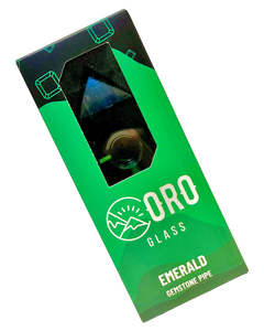 An Emerald Oro Gemstone Pipe inside its packaging.