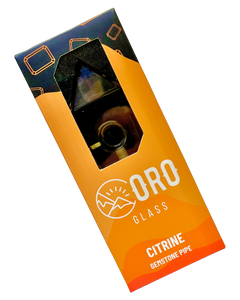 A Citrine Oro Gemstone Pipe inside it's packaging.