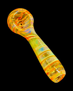 An auburn Kitchen Glass Designs Fumed Swirl Spoon Pipe showing off its color-changing fumed glass.