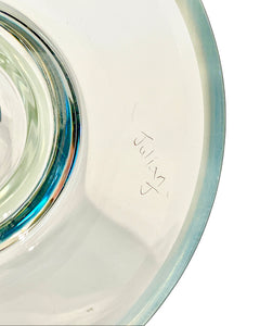 The signature of the artist of a Cane Double Doughnut Tube Pipe.