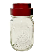 Load image into Gallery viewer, A pebble-colored GOAT Grinder AITH v.1 attached to a mason jar.
