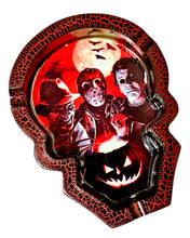 Load image into Gallery viewer, A black and red Hollywood Villians Poly Stone Skull Ashtray, featuring Freddy Krueger, Jason Voorhees, and Michael Myers.

