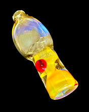 Load image into Gallery viewer, A red dotted Internal Twist Fumed Chillum Pipe handblown by the award-winning Ottone Glassworks in the dark.
