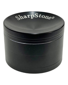 A black 63mm Sharpstone Concave Grinder.