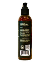 Load image into Gallery viewer, The back of a bottle of TRU Organics CBD Hand &amp; Body Lotion.
