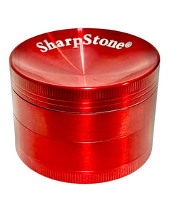 A red 63mm Sharpstone Concave Grinder.