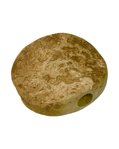 A sand-colored Onyx Round Stone One Hitter.