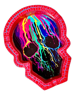 A Rainbow Skull Poly Stone Skull Ashtray.