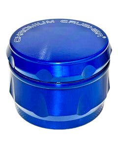 A blue Chromium Crusher Drum Grinder 55mm.
