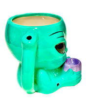 Load image into Gallery viewer, The handle and mouthpiece of a Roast &amp; Toast Alien Ceramic Mug Pipe.

