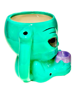 The handle and mouthpiece of a Roast & Toast Alien Ceramic Mug Pipe.