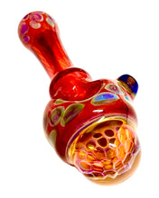 Load image into Gallery viewer, A red TKO Glassworks Floating Honeycomb Fumed Color Spoon.
