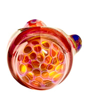 Load image into Gallery viewer, The head of a red TKO Glassworks Floating Honeycomb Fumed Color Spoon.
