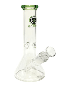 A Clear Beaker Bong with a green mouthpiece and logo.