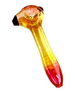 A TKO Glassworks Fumie Wrap n' Rake Spoon Pipe.