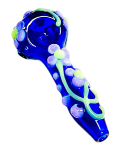 A TKO Glassworks Purple Flower Spoon Pipe.