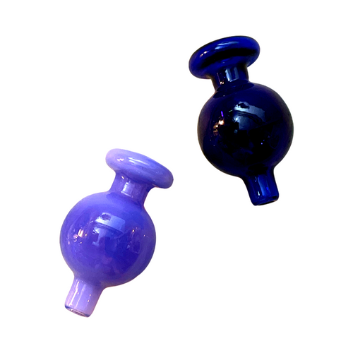 A blue and purple Nice n' Clean Carb Cap.