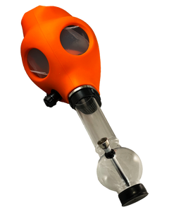 An orange Gas Mask Bong with a clear acrylic bong.