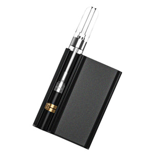 A black CCELL Palm Pro Battery with a dab cartridge inside it.