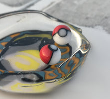 Load image into Gallery viewer, A Handmade Poké Ball Terp Pearl Set, created by Byte Glass.
